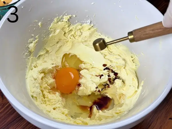 Stir in almond extract and ground almonds