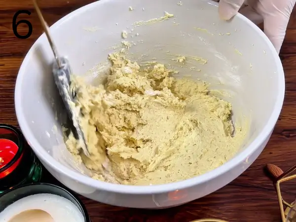 Shape cookies on baking tray