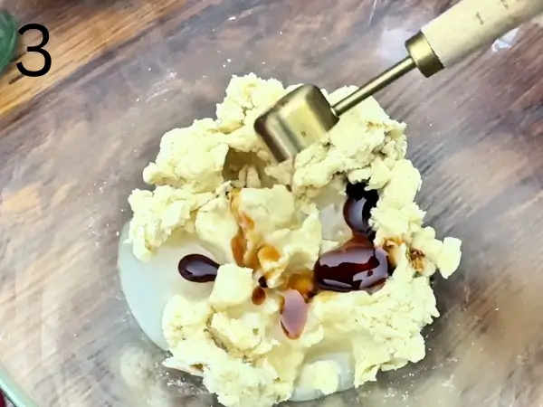 Mixing condensed milk into the dough