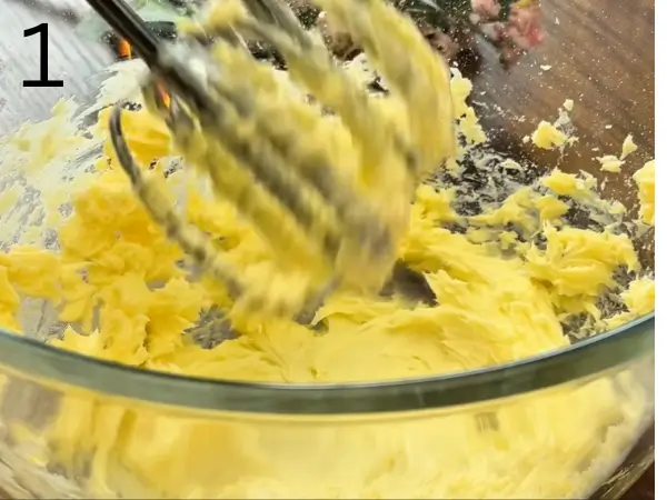 Mixing butter and icing sugar until smooth