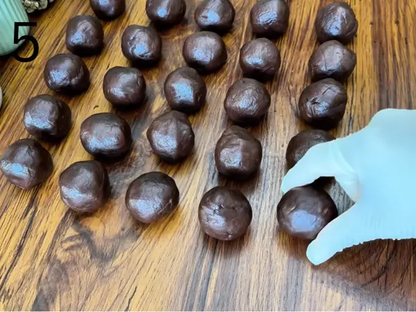 Shaping chocolate cookie dough into balls