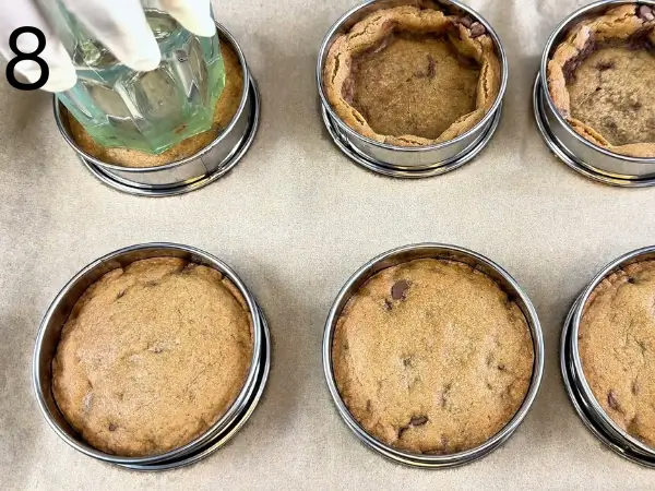 Baked stuffed chocolate chip cookies ready for filling center
