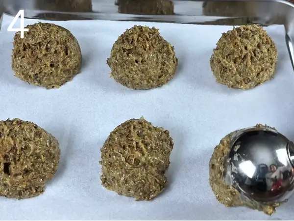 shaping pistachio filling into small even balls using a scoop