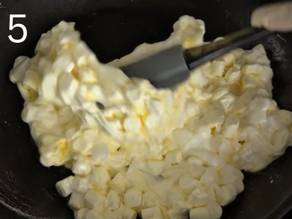 melting marshmallows with butter until smooth