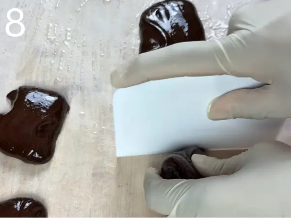 cutting marshmallow dough log into equal pieces