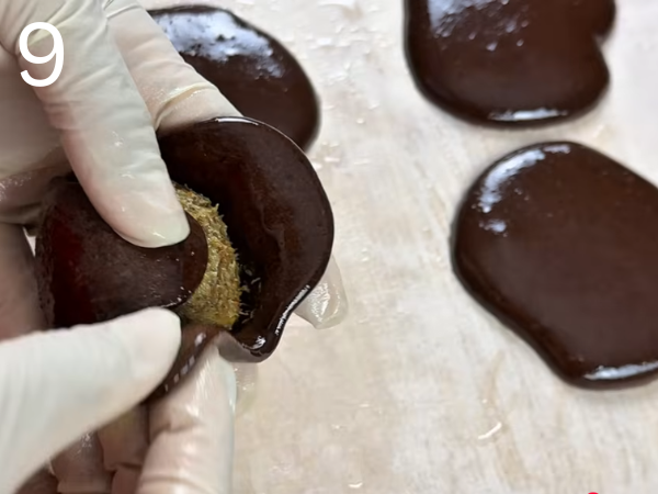 shaping Korean marshmallow chocolate cookies with pistachio filling