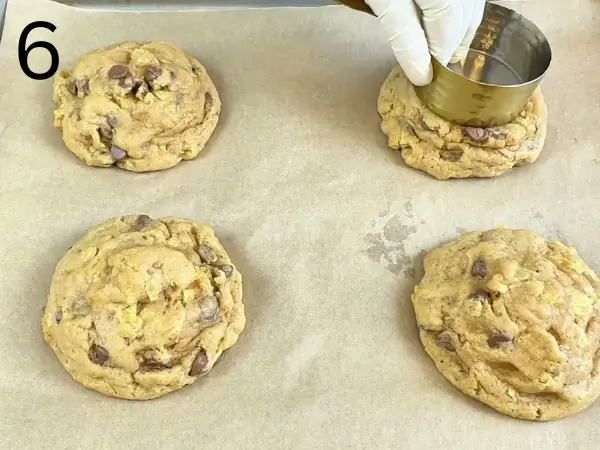 Cookies baking in oven until golden and crispy edges form