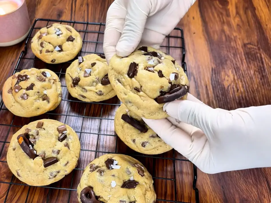 Close-up of eggless chocolate cookies with melted chocolate chips and golden edges