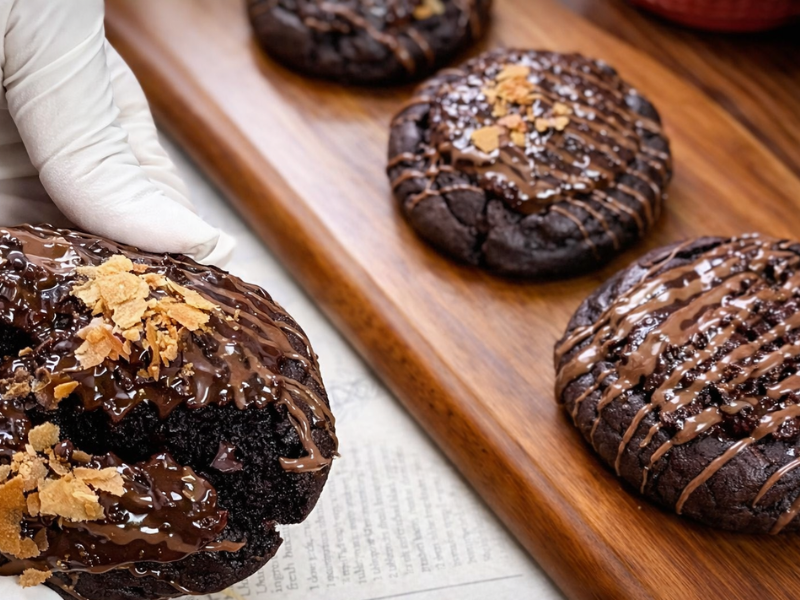 Chocolate cookies with crispy chocolate topping served on a plate