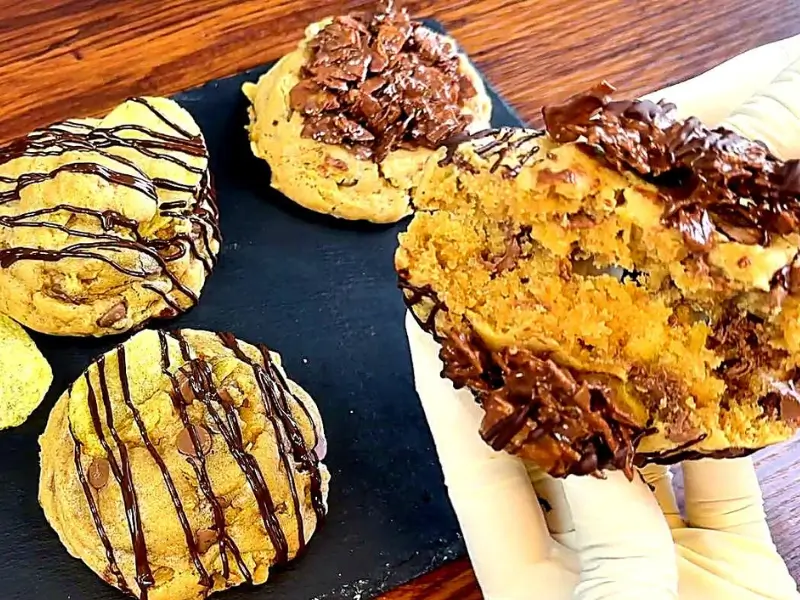 Close-up of soft and crispy chocolate cookies with melted chocolate and crunchy texture