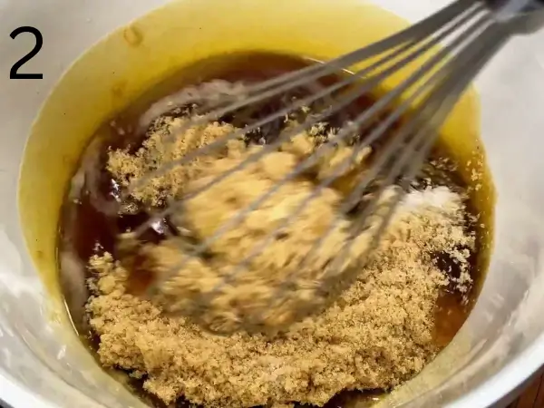 Mixing butter and sugar for cinnamon roll cookies dough