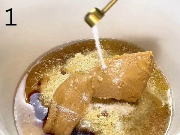 Mixing almond mixture in a large bowl