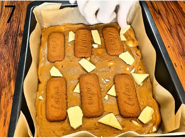 Filling cookie molds with soft chocolate chip cookie dough