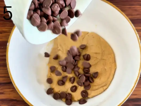 Folding chocolate chips into NYC Brown Butter Cookie dough