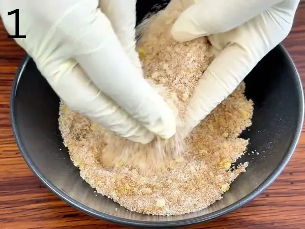 Mixing sugar with fresh lemon zest for Lemon Cheesecake Cookies