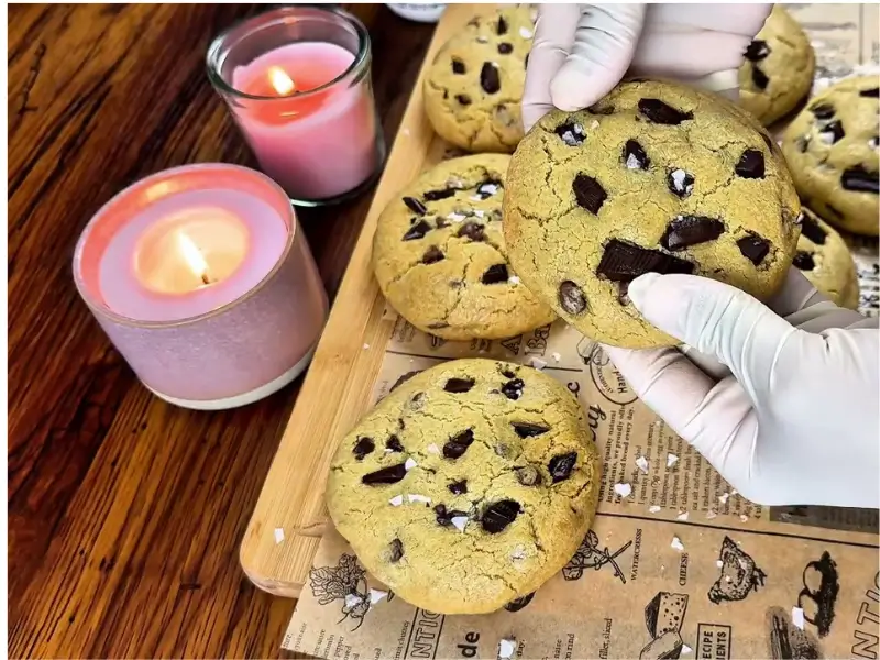 Freshly baked Nutella Chocolate Chip Cookies with gooey Nutella centers, melted chocolate chips, and flaky sea salt.
